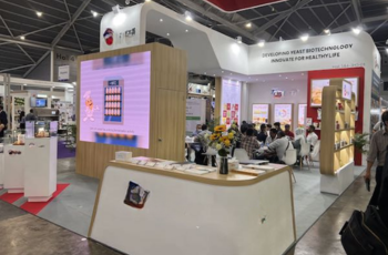 Booth with innovative structure and LED lighting, drawing visitors at FHA, Food & Beverage Asia 2025.