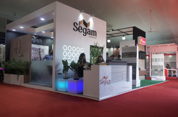 Segam booth with a sleek design and welcoming atmosphere at ProWein Trade Fair 2025, showcasing sustainable solutions.