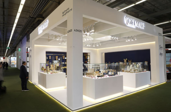 Brightly lit product display booth with minimalistic design, perfect for showcasing consumer goods at Ambiente 2025