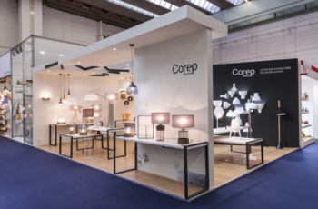 Contemporary booth showcasing lighting and decor items with an open, modern design at Indiasoft 2025, Messe Frankfurt