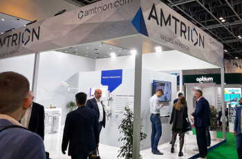 Amtrion's modern and minimalistic healthcare booth displaying innovative medical solutions at SATTE 2025 in Dubai